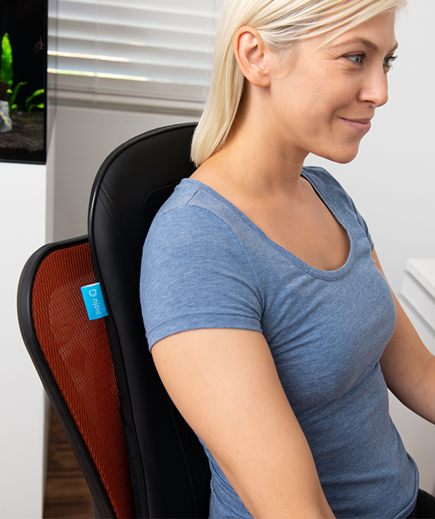 person enjoying a seated heated massage