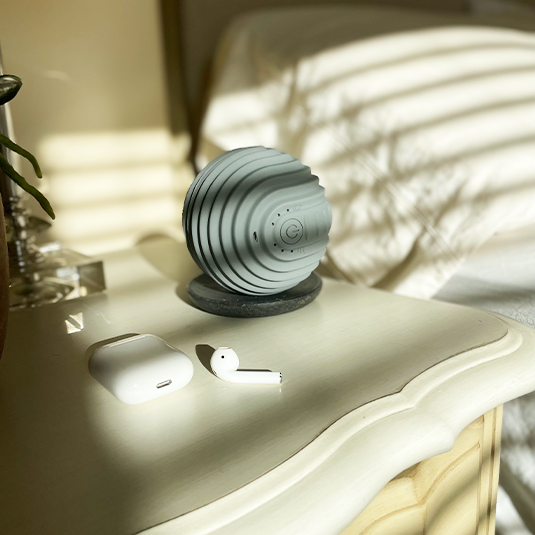 charging the gray vibrating massage ball