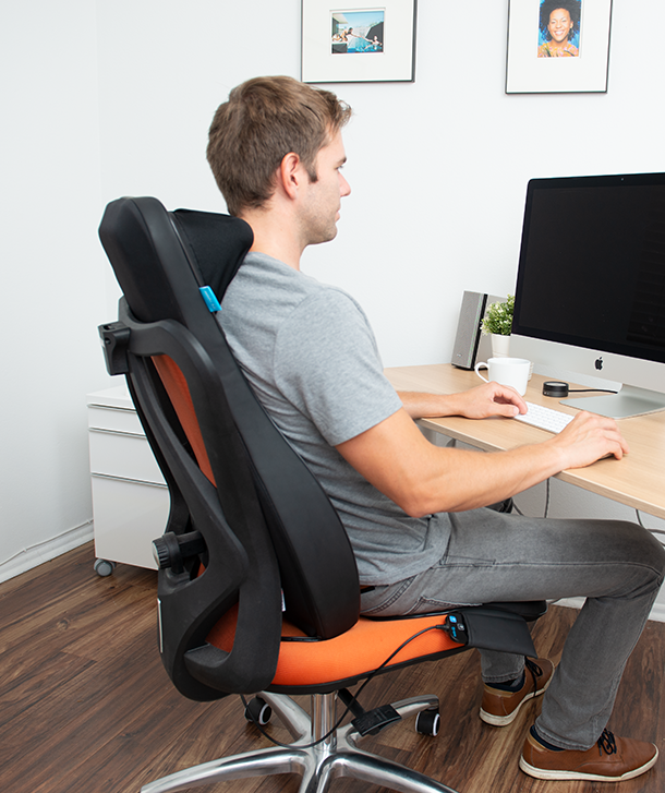 working from home in office chair with the shiatsu massage seat cushion